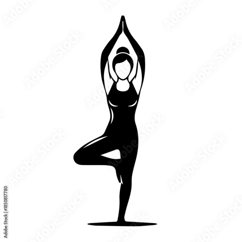 Woman performing tree pose in yoga