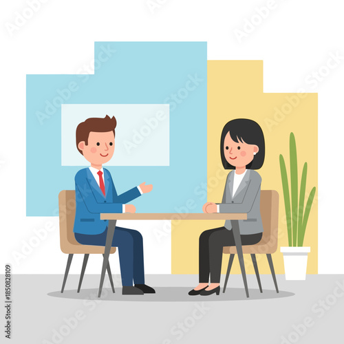 Two professionals engaged in a business discussion at a modern office table with colorful backgrounds