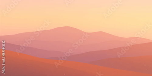A golden morning light illuminates the misty mountain landscape as the sun rises over the horizon, casting an orange glow across the clouds and silhouetted peaks at dawn