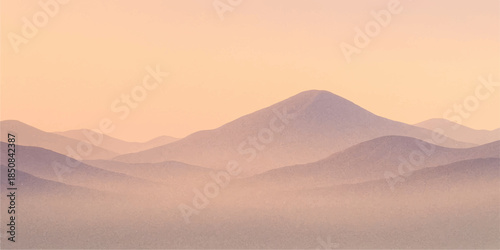 A breathtaking sunrise and sunset view over orange desert sand dunes and misty mountain peaks under a vibrant summer sky in the Sahara landscape of Morocco