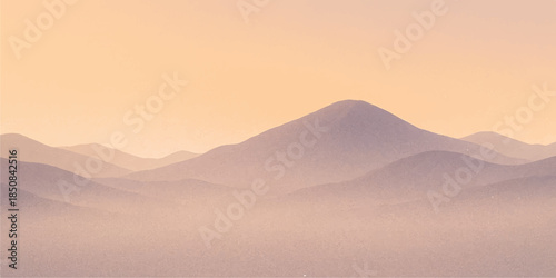 A vibrant mountain landscape at dawn reveals a glowing orange horizon as the sun rises over desert sand dunes and misty peaks under a summer sky
