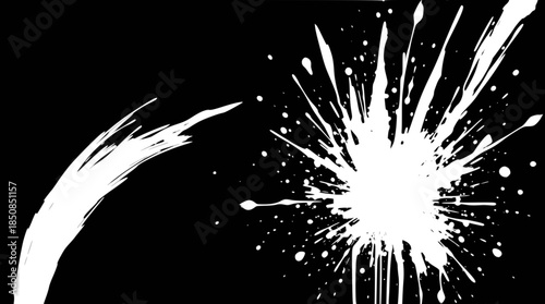 A striking black and white graphic featuring an explosive paint splatter, radiating outwards with dynamic energy and abstract forms.