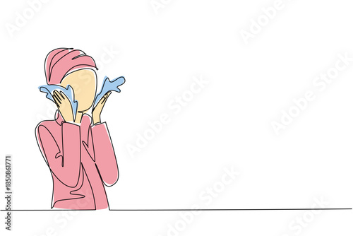 Single one line drawing a woman wearing a towel robe doing facial treatment. Washing face. Wash with clean and cold water. National Skincare Education Day. Continuous line design graphic illustration