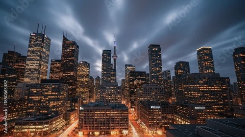 Toronto city skyline at night with long exposure clouds creating dynamic atmosphere