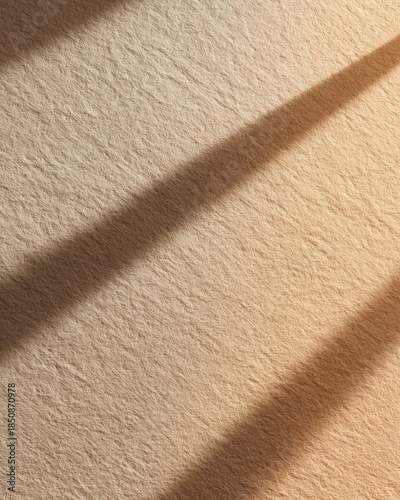 Texture of Light: Abstract composition featuring light and shadow dancing across a textured surface, creating a visual symphony of contrasts and patterns.