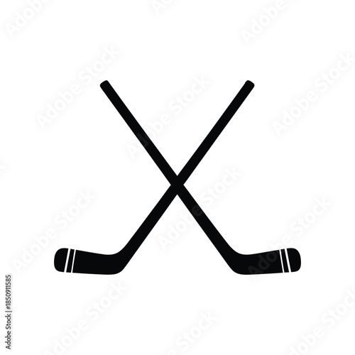A simple black and white illustration of two crossed hockey sticks