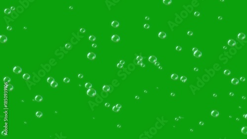 Flying water bubbles green screen motion graphics, 4k, loop. flying soap bubbles on green screen background , vertical orientation. Soap bubbles rise towards a green screen