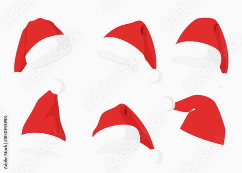 Several red santa hats with white trim are scattered across a white background