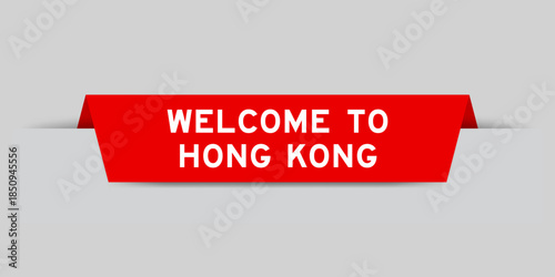 Red color inserted label with word welcome to hong kong on gray background