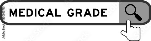Search banner in word medical grade with hand over magnifier icon on white background