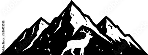 Majestic stag stands proudly against rugged mountain peaks, embodying wild spirit and natural beauty in a striking silhouette.