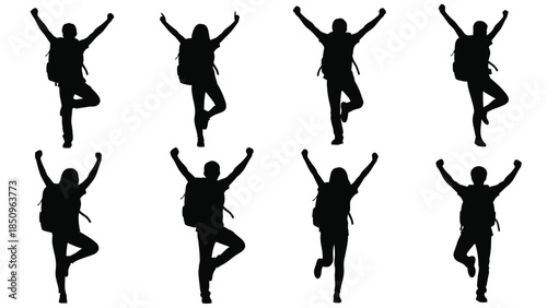 Eight happy hikers celebrating victory with raised arms 