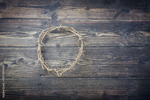 Crown of Thorns on a Rustic Brown Textured Background