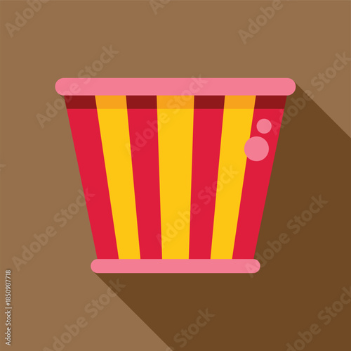 Classic cinema popcorn bucket featuring red and yellow stripes and pink trim, set against a brown backdrop