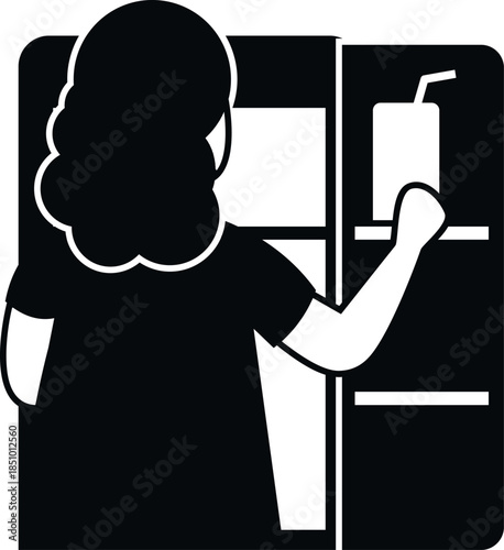Woman standing opening refrigerator door and taking out a carton of juice