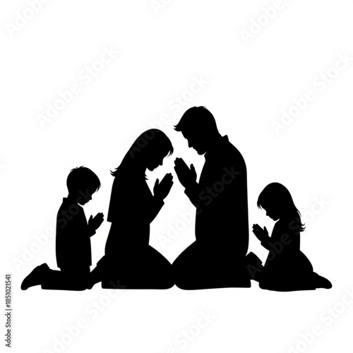 Silhouette of a family of four praying together in a serene moment