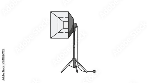 Studio lighting equipment setup with softbox on a tripod stand.