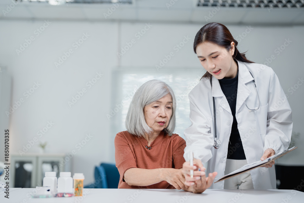 Fototapeta premium Doctor discussing treatment plan with senior patient
