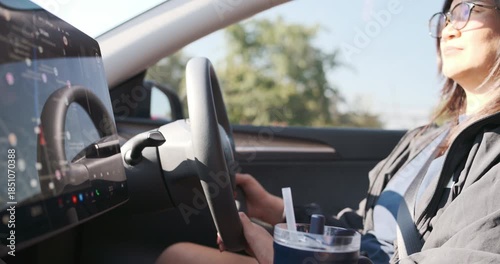 Tourist woman drive EV car use navigator travel trip transport technology