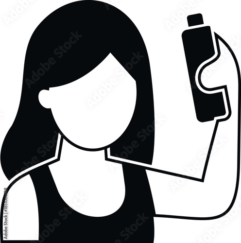 Woman holding a bottle of hair dye, representing beauty and personal care