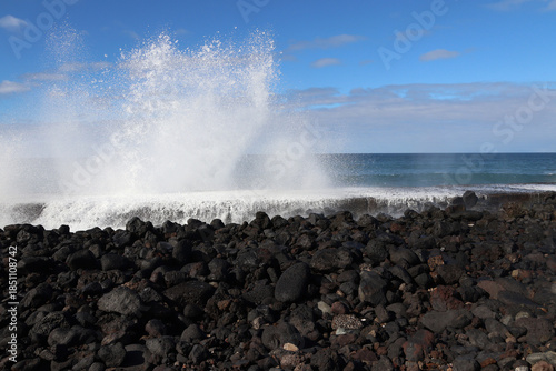 Large wave washing over the city wall (Puerto de la Cruz, Tenerife, Canary Islands, Spain)