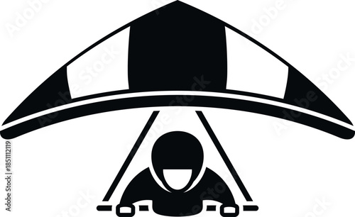 Person flying a hang glider, depicting an extreme sport and recreation