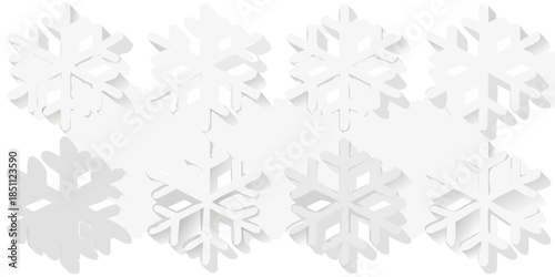 A collection of intricately designed white paper snowflakes on a transparent background