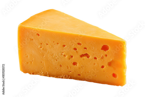 Wedge of cheddar cheese isolated on transparent background. Sharp cheddar cheese wedge delicious dairy food snack ingredient isolated on white background.