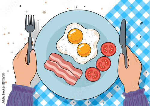 A top view of a classic breakfast: bacon, fried eggs and tomatoes