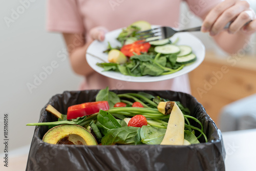 Food waste environment concept, people throwing food garbage into bin prepare to decompose.