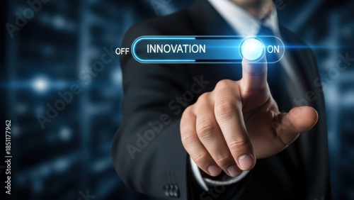 Innovation Switch Activation: Businessman finger moving a digital slider to turn on innovation for corporate growth and creative thinking
