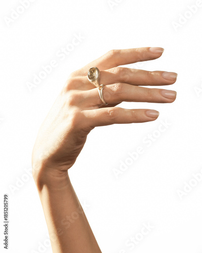 Elegant Female Hand with Nude Manicure and Rings on White Background