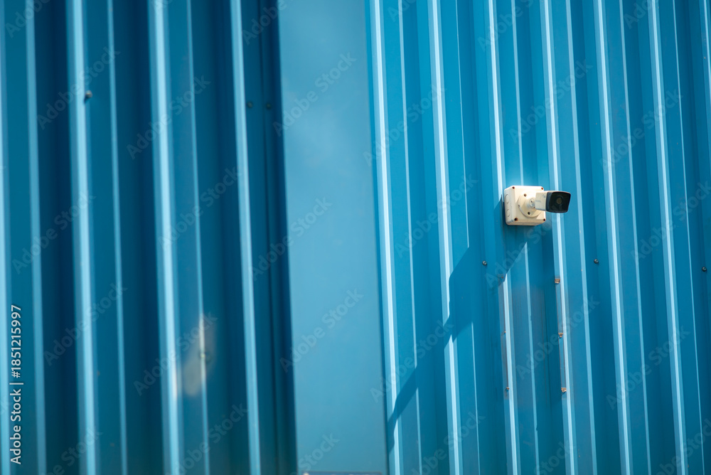 Obraz premium Blue Wall with Security Camera Detail