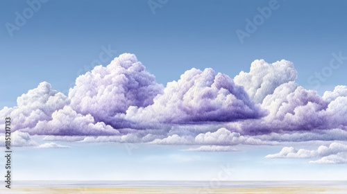 Wispy, soft clouds in a vibrant blue sky over a serene, hazy horizon