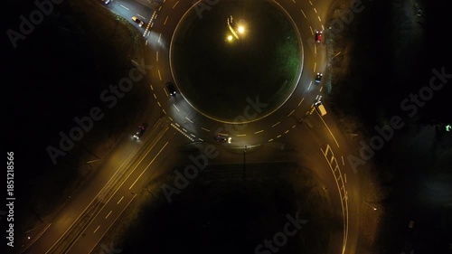Aerial Night View of Roundabout with Moving Traffic