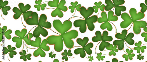 Happy St Patrick's Day concept. Greeting card design with four leaf clovers and gold coins on green background.