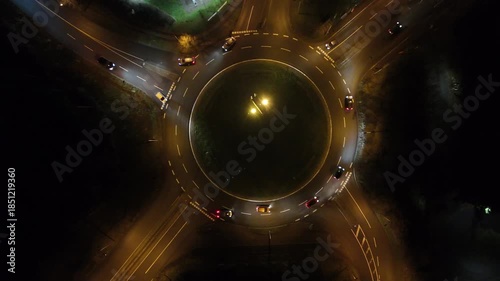 Aerial Night View of Roundabout with Moving Traffic