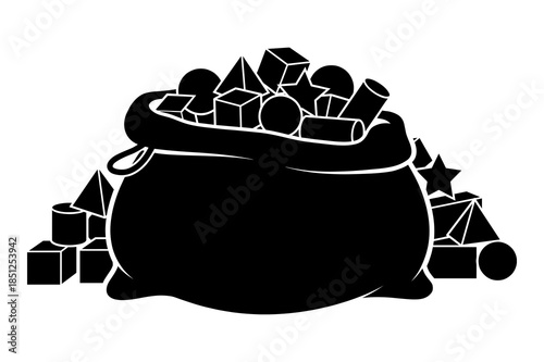 Silhouette of a full sack overflowing with various geometric shapes and blocks for play or design