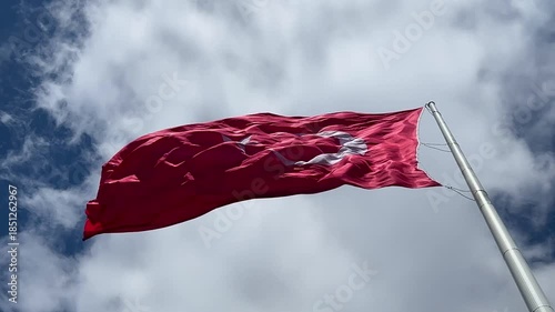 Turkish flag waving in the wind, red and white flag with crescent and star.