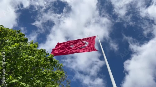 Turkish flag waving in the wind, red and white flag with crescent and star.
