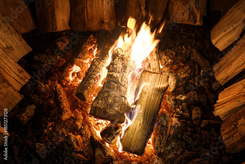 A bonfire burning in the night. A close up of burning bonfire flames