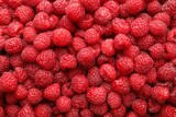 Fresh ripe raspberries as background, top view