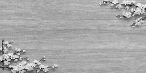 Vintage white flowers on an old wooden surface and black grunge cement background with a silver marble texture and winter snow patterns