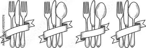 Elegant silverware sets with ribbon banners for formal dining