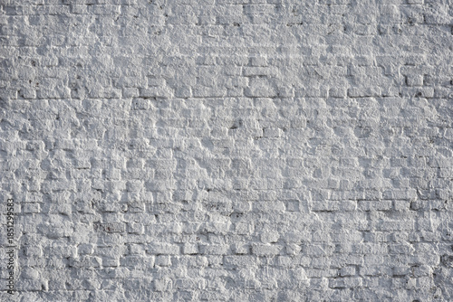 Old white painted brick wall, vignette.