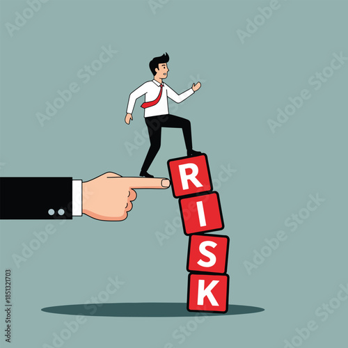 Businessman walking on RISK blocks supported by a hand symbolizing business challenge and opportunity.