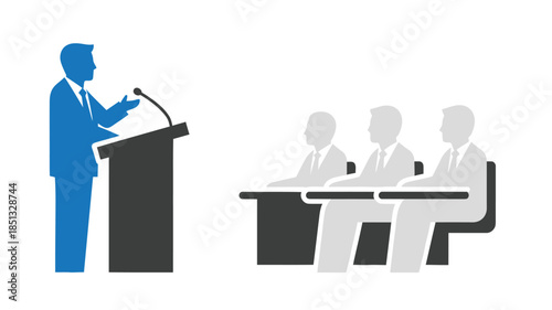 A public speaker addressing an audience with a panel of judges or interviewers present