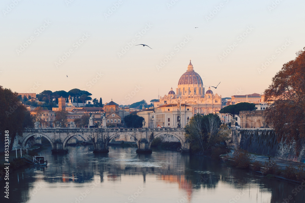 Obraz premium View of St. Peter's Basilica in Vatican, Tiber River and Aelian Bridge in early morning skyline at sunrise, idyll, Rome, Italy.