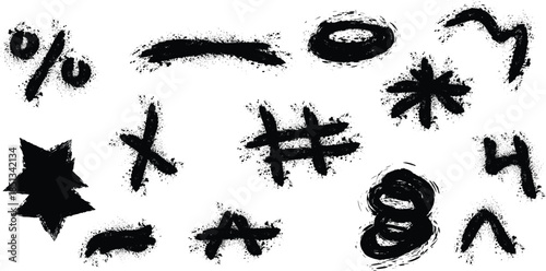 A collection of black smudged symbols on white background