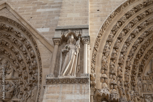 Gothic Sculpture Detail and Archivolts on the Facade of Notre Dame Cathedral, Paris